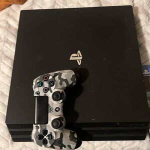 Sony Black and Gray Console with DualShock 4 Controllers